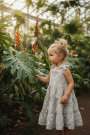 4-Year-Old Girl in Tropical Dress - Botanical Garden