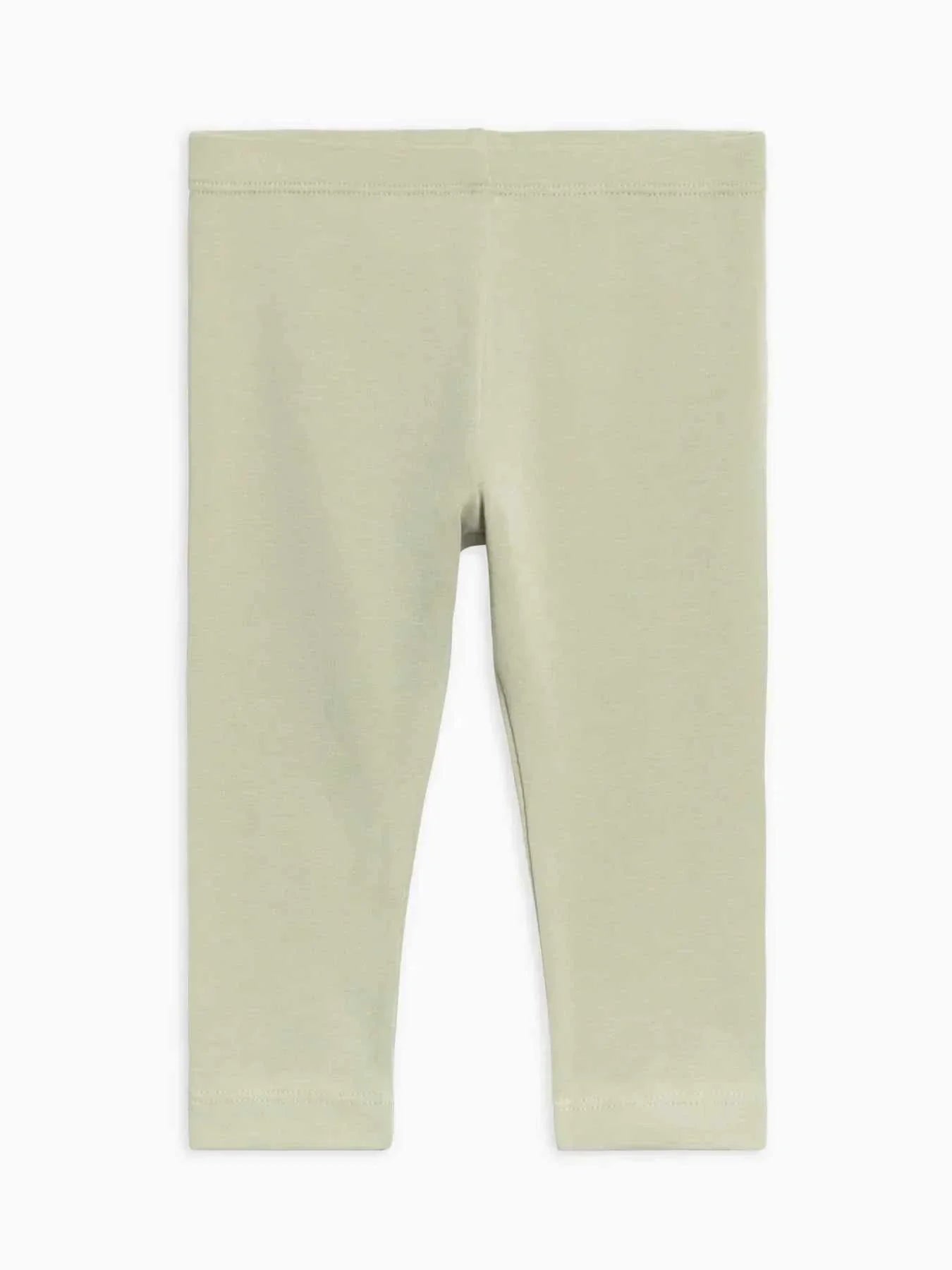 Organic cotton leggings for kids in light green, offering comfort, stretch, and sustainability.