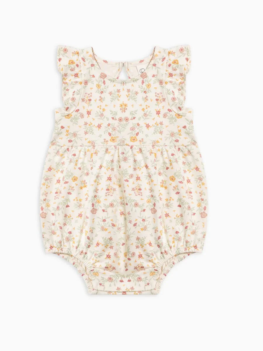 Adorable Sommer Romper with floral design, ruffle sleeves, and gathered waist, made from organic cotton.