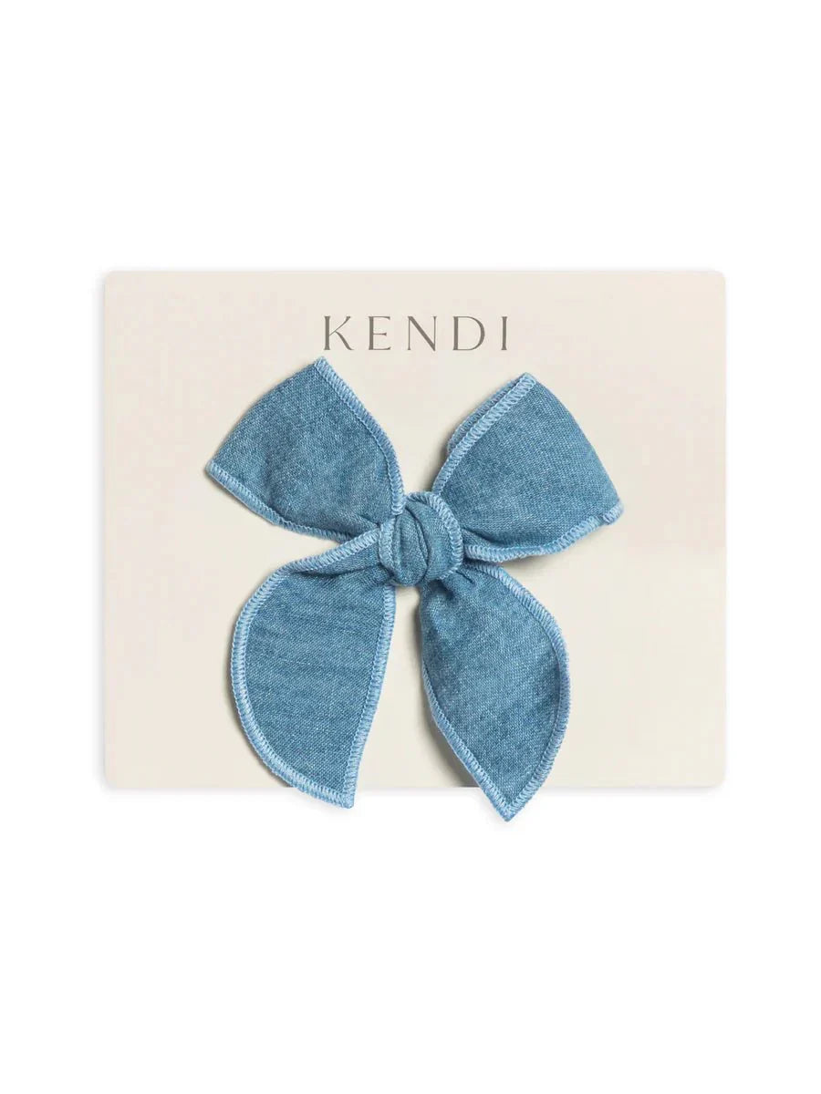 Organic chambray bow clip on cream card.