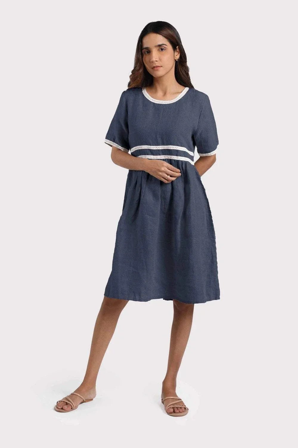 High Frequency Organic Linen Dress with lacework and pleats.