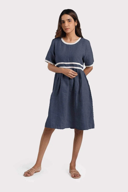 High Frequency Organic Linen Dress with lacework and pleats.