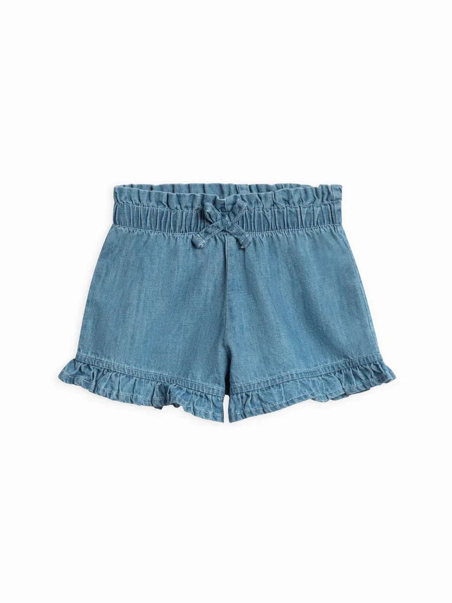 Callie Chambray Ruffle Waist Short with bow and ruffle details in organic cotton.