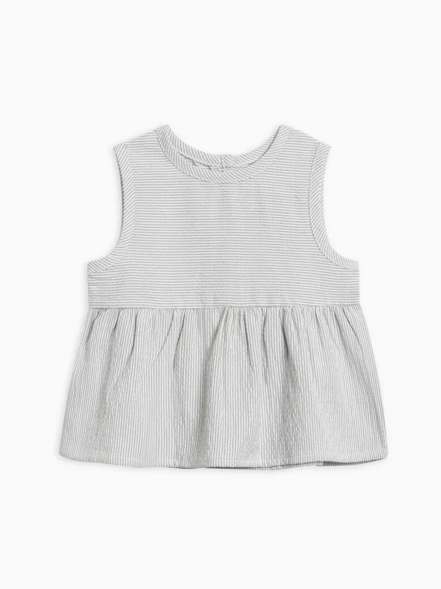 Seersucker Peplum Top with wooden button detail, made of organic cotton.