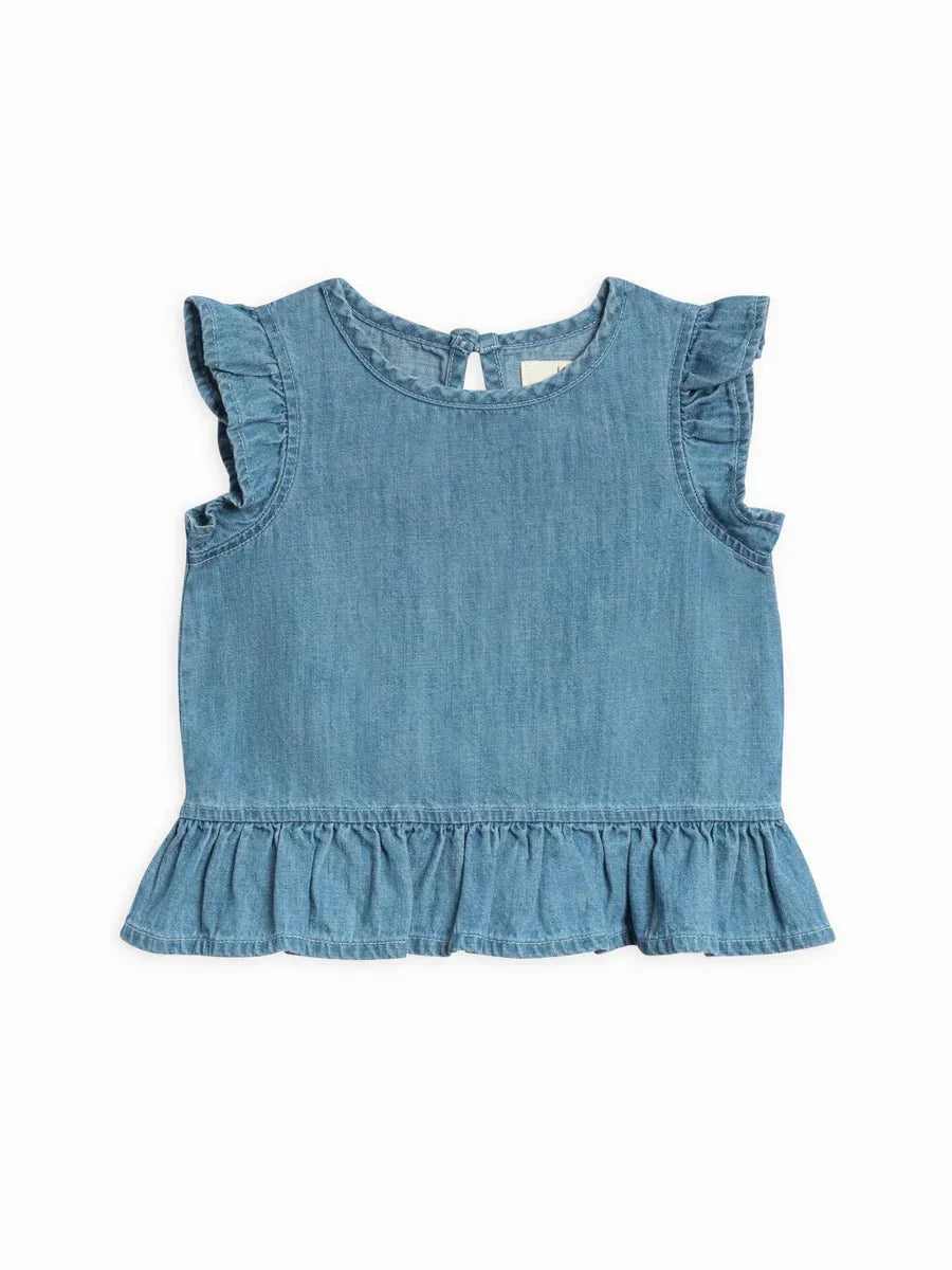 Anya Chambray Ruffle Hem Top with ruffle sleeves and hem, organic cotton fabric, and back keyhole button closure.