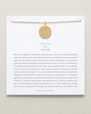 Faith Over Fear Necklace in gold with adjustable chain, symbolizing resilience and unwavering faith.