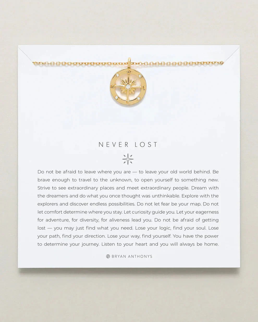 NEVER LOST NECKLACE with compass design in 14k gold on inspirational card.
