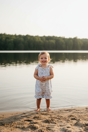 Toddler in Exact Ocean Wave Jumpsuit at Lake