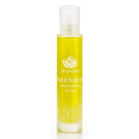 Hair and Scalp Oil bottle showcasing nourishing hair care solution.