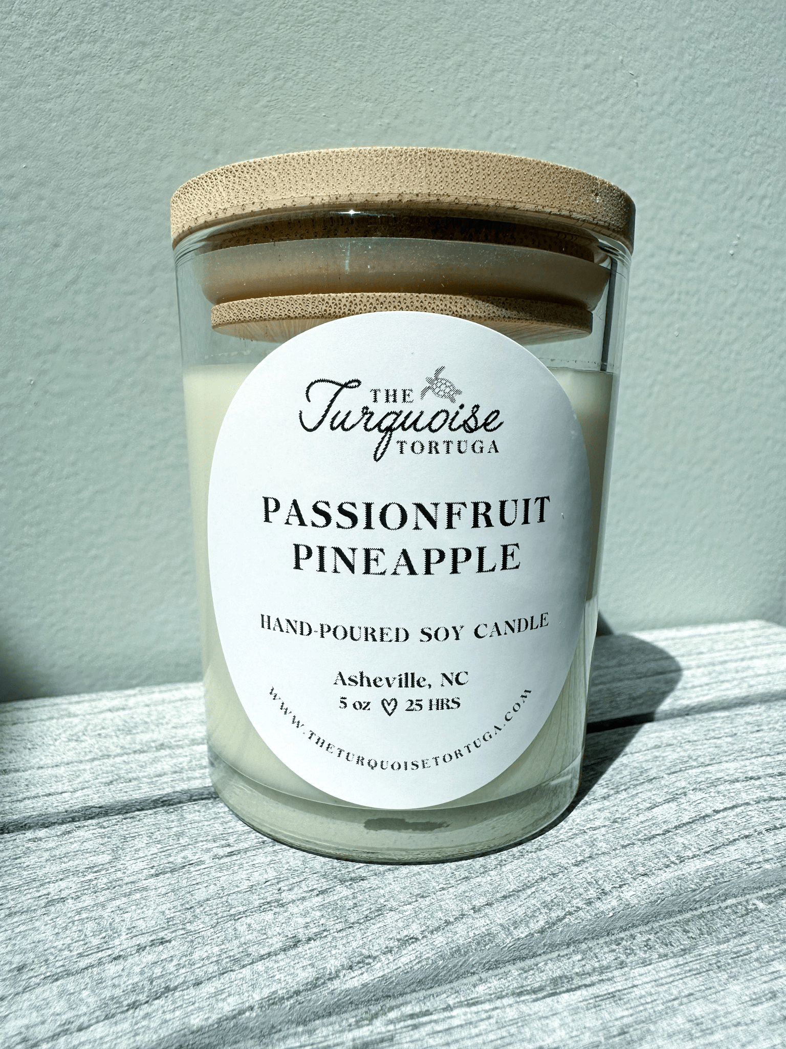 Small glass candle with silver lid, 100% soy wax, handcrafted, 5 oz, passionfruit pineapple scent.