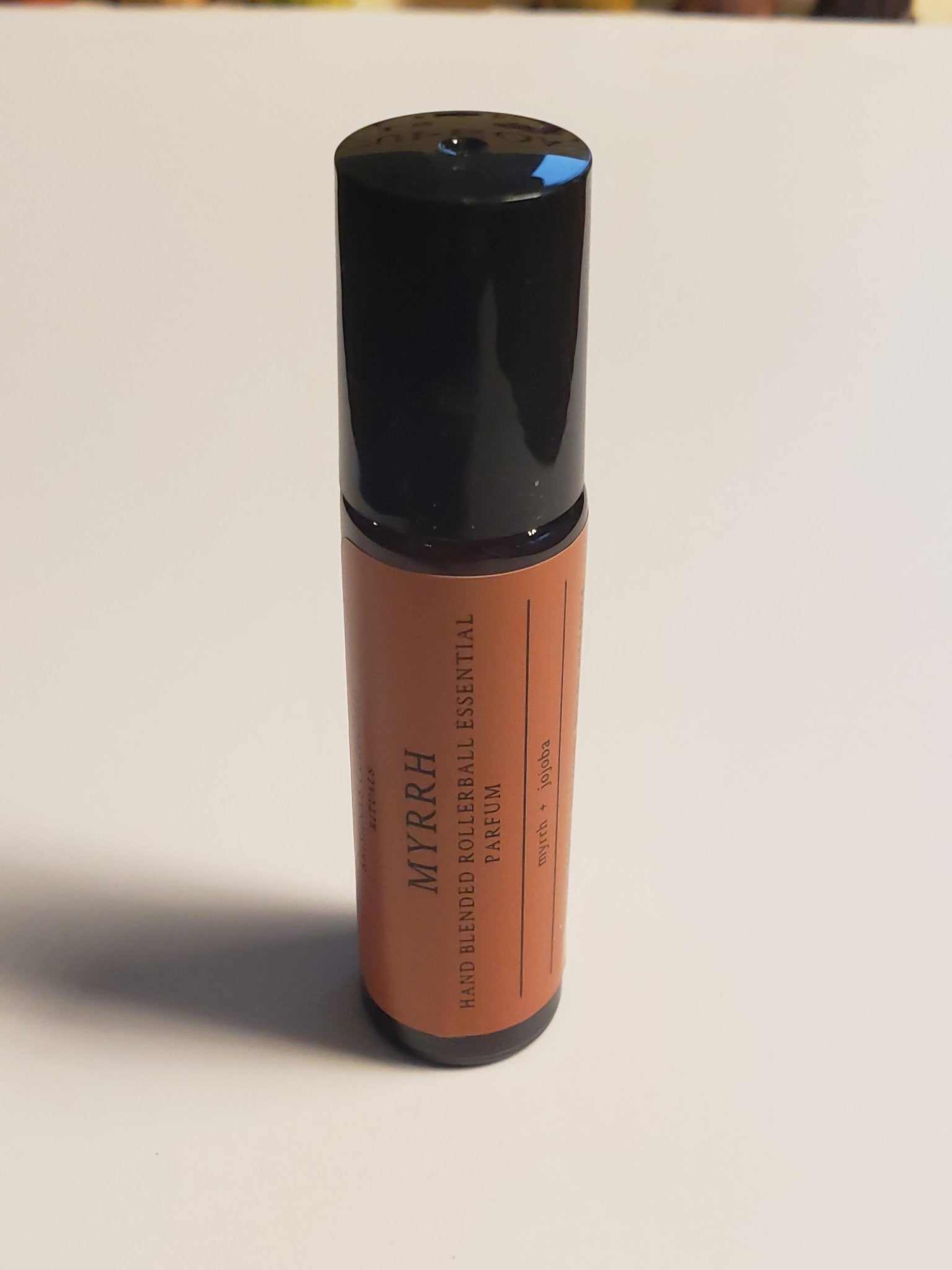 Myrrh Roll-On with organic ingredients and easy application design.